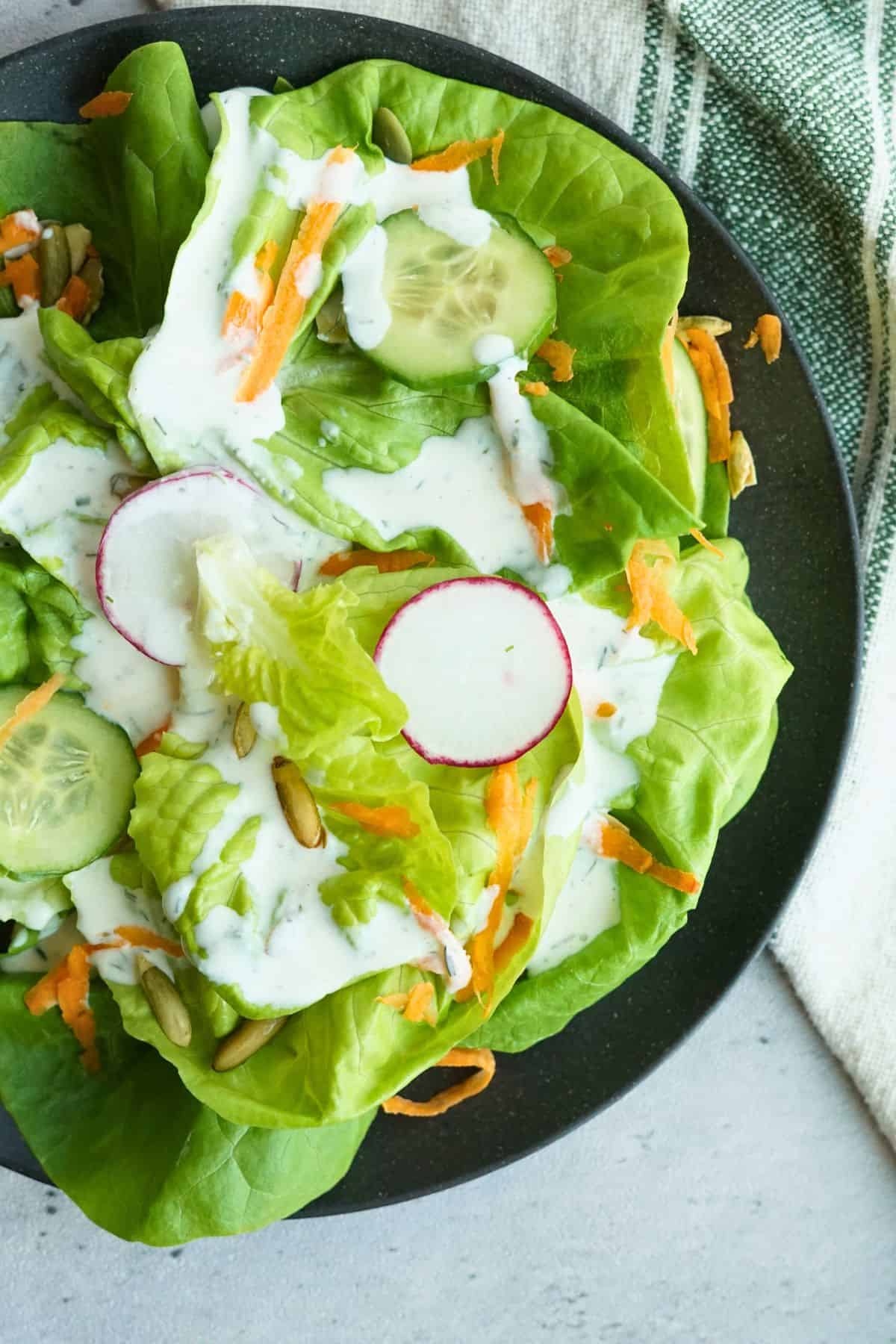 greek yogurt ranch on salad and vegetables