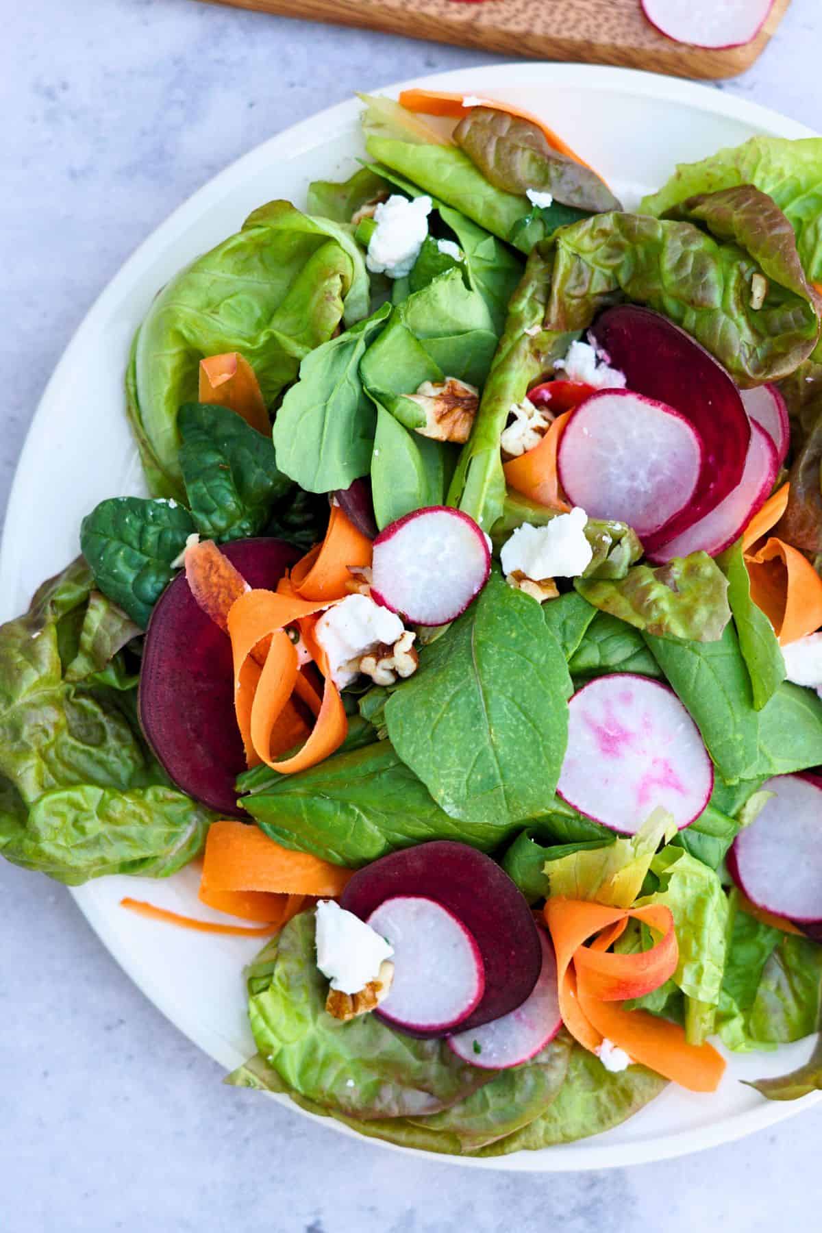 spring salad on white plate
